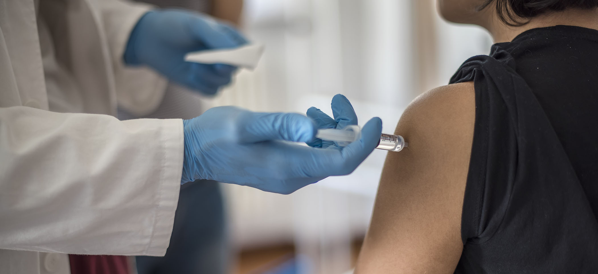 person getting vaccine