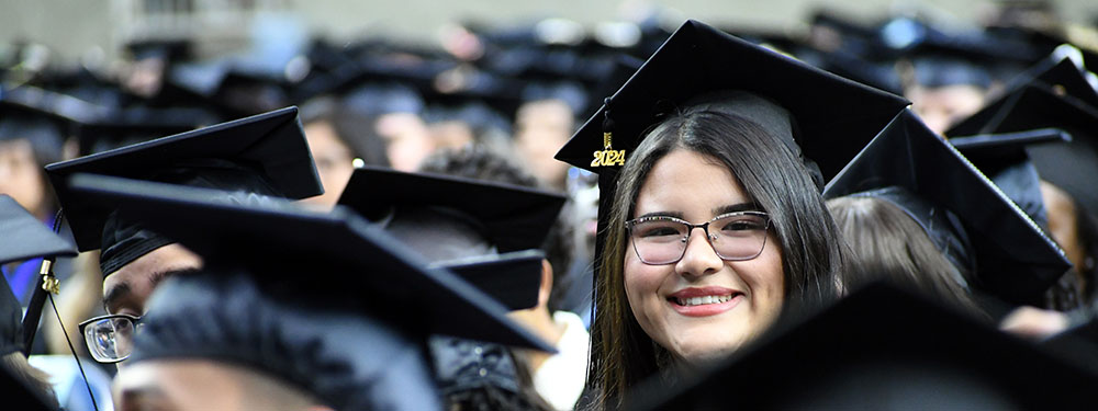 San Jacinto College smiling graduate